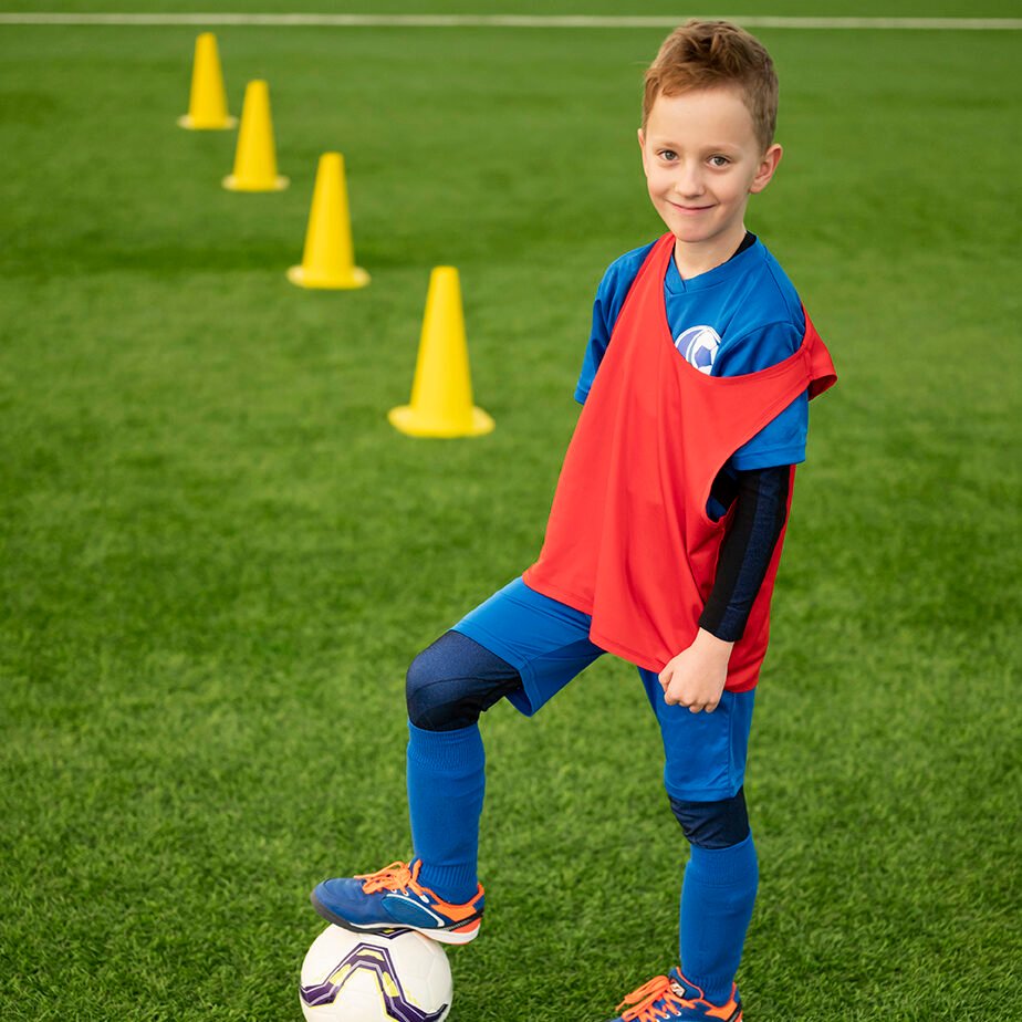 full-shot-child-football-field