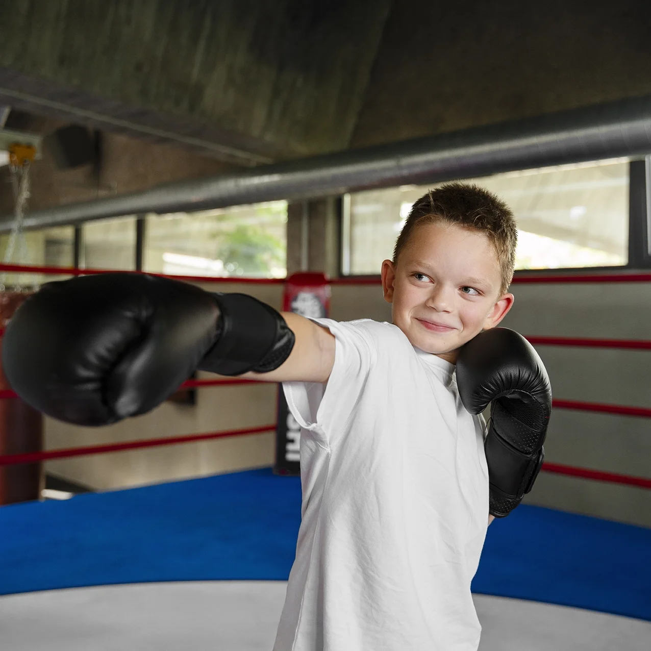 side-view-kid-practicing-boxing